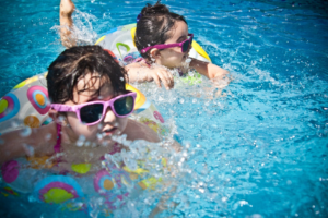 Toddlers playing in the pool